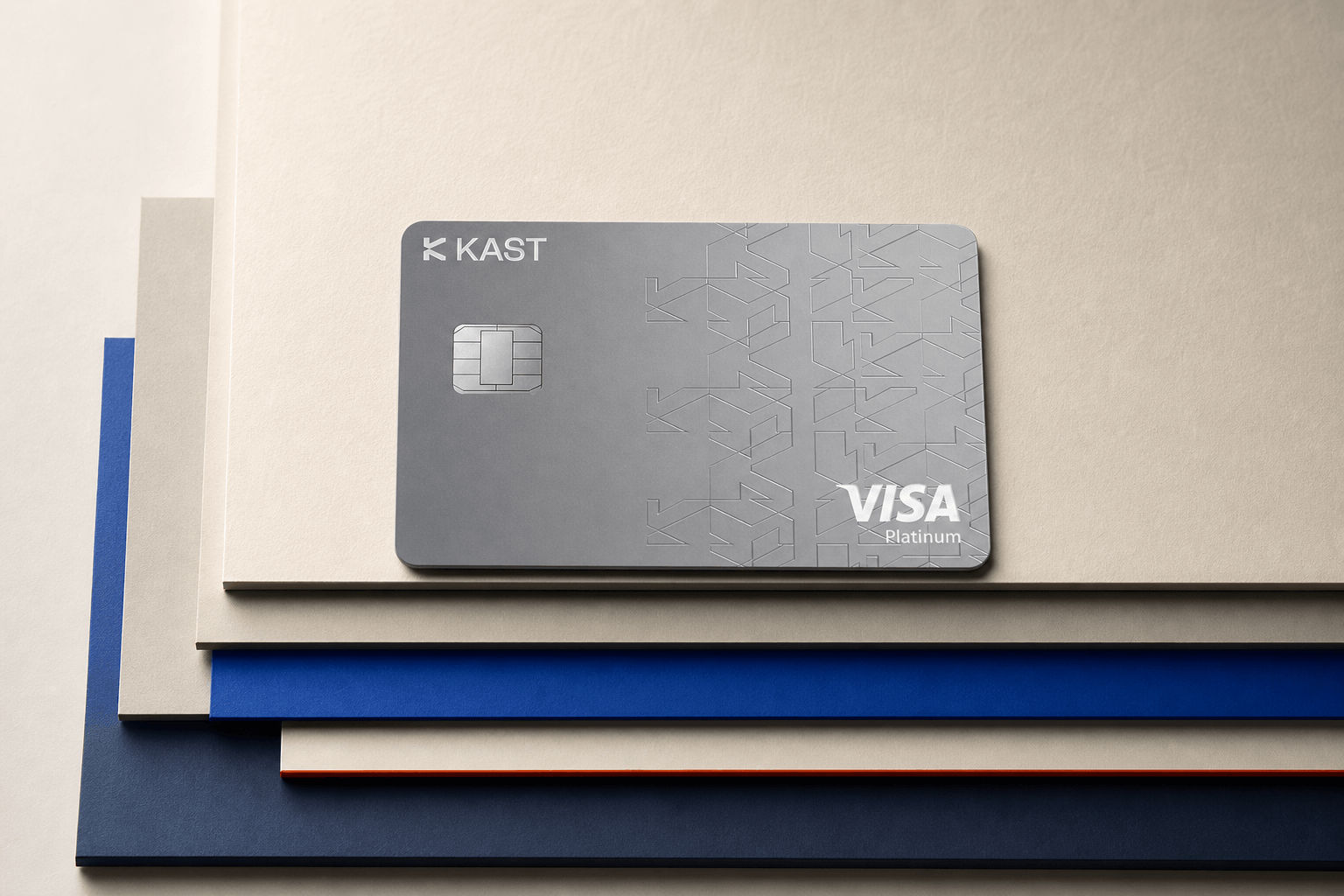 KAST card resting in perspective across layered ivory, cobalt and ink editorial surfaces